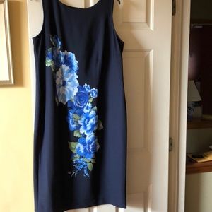 Gorgeous blue floral dress. Below the knee.